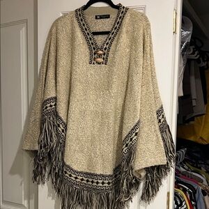Elegant Beige Fringed Poncho